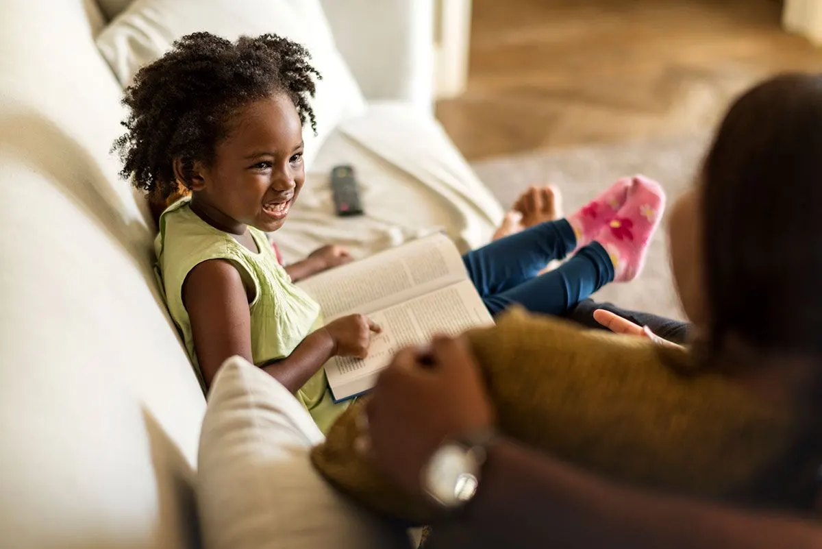 African child playing with her parents – Long Term Fostering Options with Match Foster Care